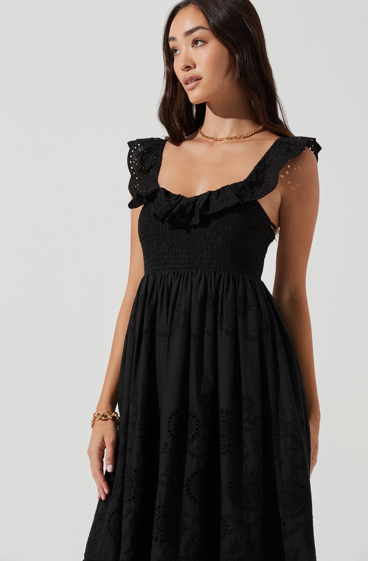 Black embroidered ruffled dress by Athira Designs